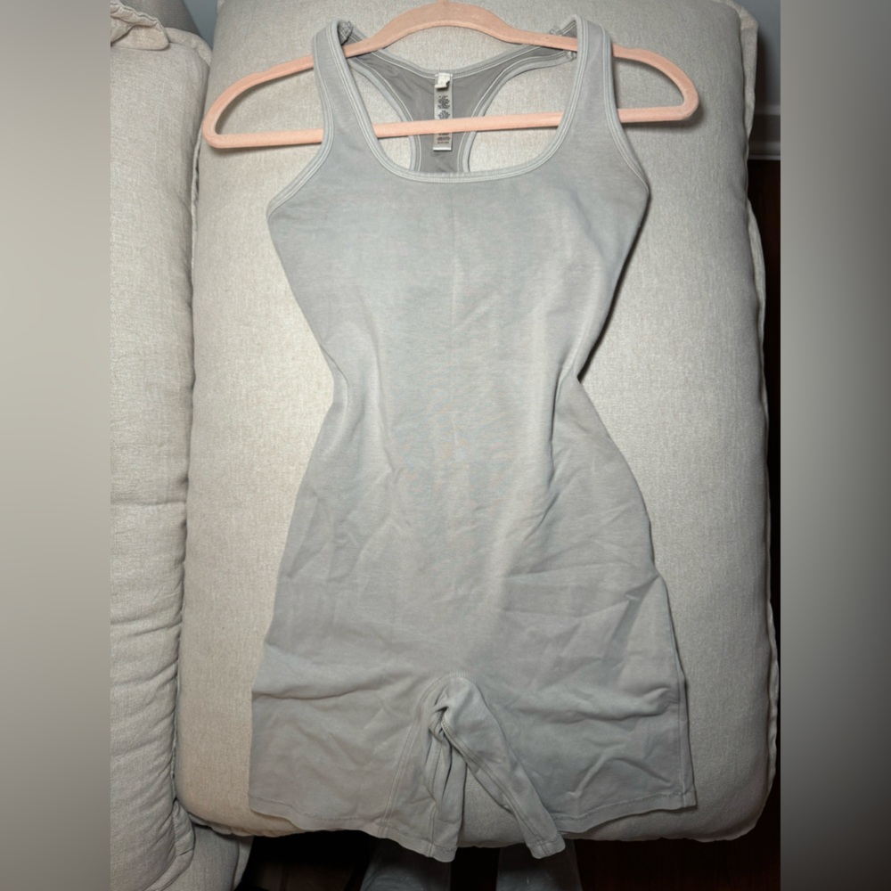 Skims Cotton Jersey Onesie in Stone